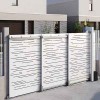 Telescopic sliding gate system with multiple panels installed at commercial entrance in UAE