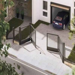 Bi-folding swing gate system installed at commercial entrance in UAE